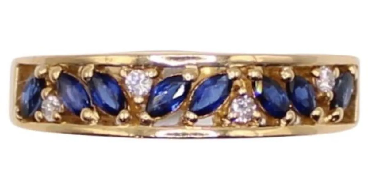 Autre Marque Anillo liga de oro amarillo con zafiros y diamantes 750%O Azul oscuro Gold hardware 