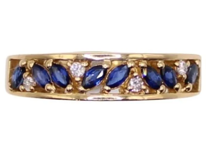 Autre Marque Anillo liga de oro amarillo con zafiros y diamantes 750%O Azul oscuro Gold hardware 