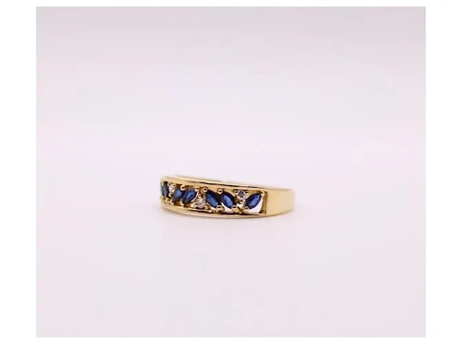 Autre Marque Anillo liga de oro amarillo con zafiros y diamantes 750%O Azul oscuro Gold hardware 