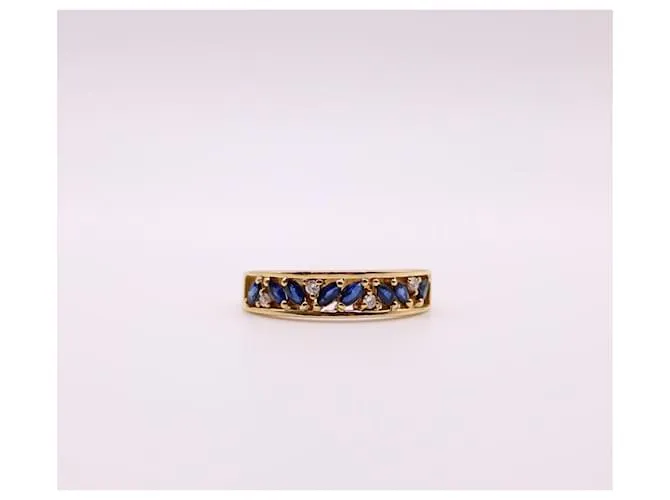 Autre Marque Anillo liga de oro amarillo con zafiros y diamantes 750%O Azul oscuro Gold hardware 