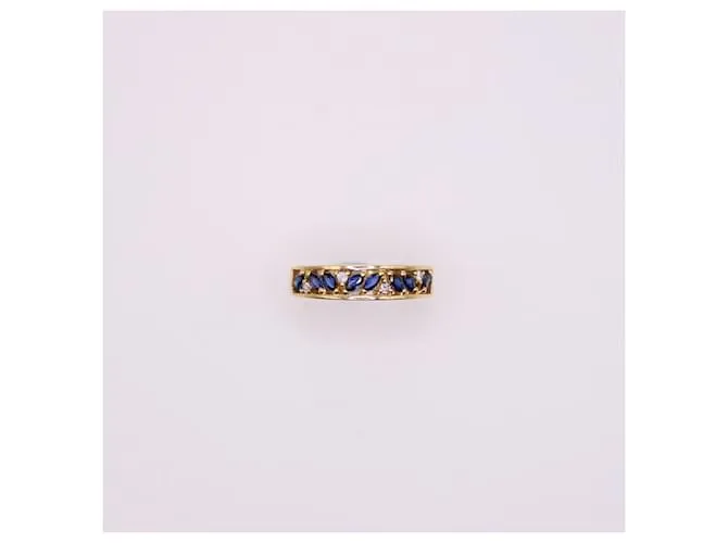 Autre Marque Anillo liga de oro amarillo con zafiros y diamantes 750%O Azul oscuro Gold hardware 